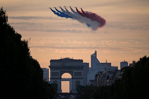 2024 Paralympics Opening Ceremony: Alpha Jets from the Patrouille de France fly over the Champs-Elysees